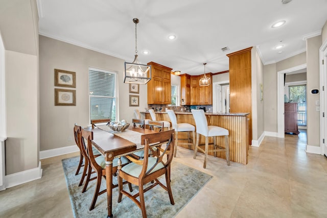 dining space with a notable chandelier, crown molding, and a wealth of natural light