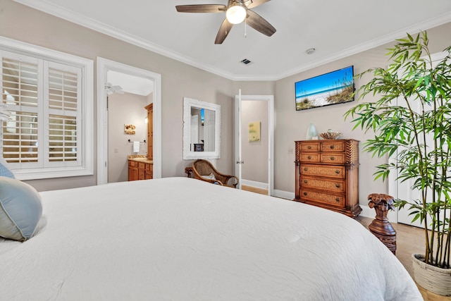 bedroom featuring ensuite bathroom, ceiling fan, and ornamental molding