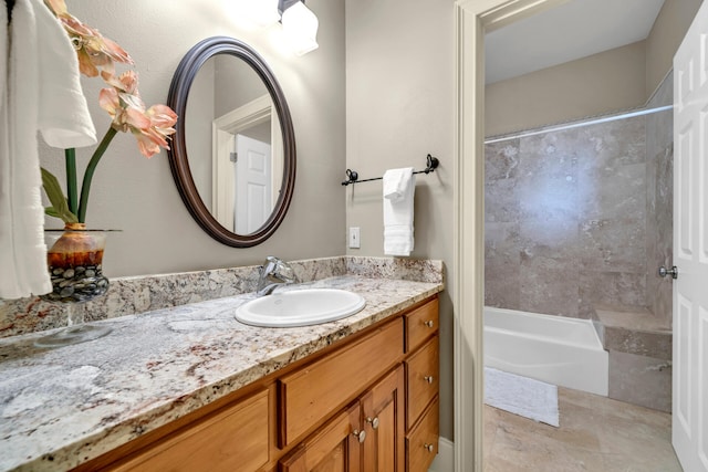 bathroom featuring vanity and shower / bathtub combination