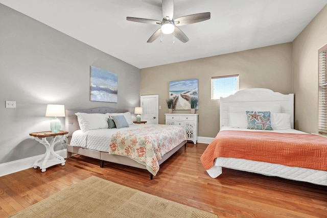 bedroom featuring hardwood / wood-style floors and ceiling fan