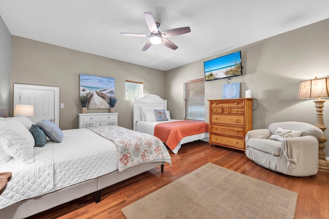 bedroom featuring ceiling fan and wood-type flooring