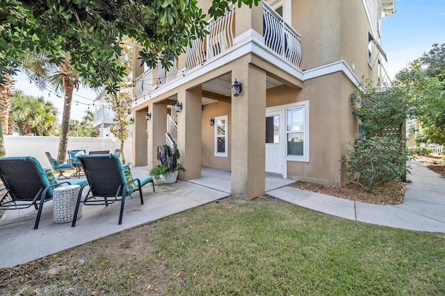 view of patio / terrace with a balcony