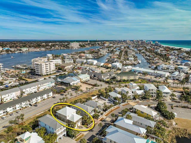 bird's eye view with a water view