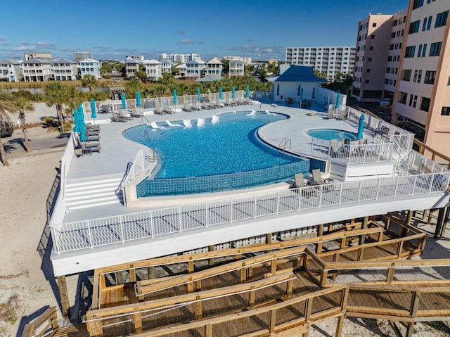 view of swimming pool with a patio