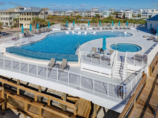 view of swimming pool with a patio