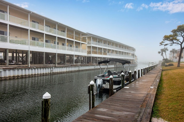 dock area featuring a water view