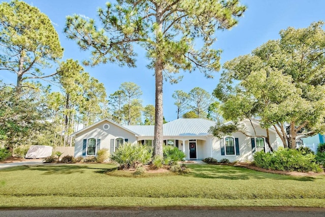 ranch-style home with a front yard