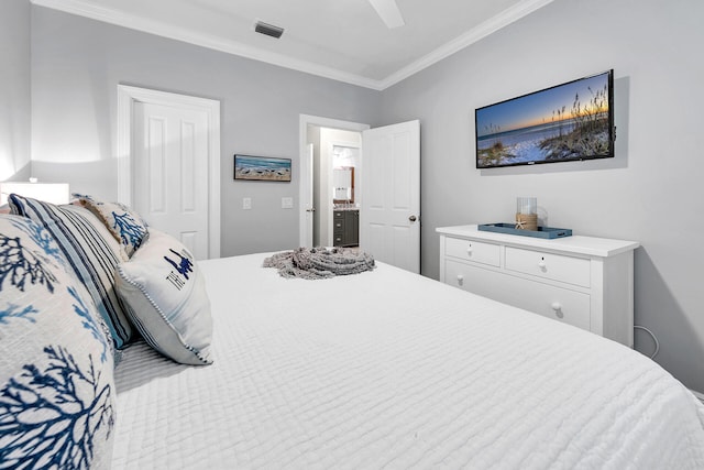 bedroom with ceiling fan and ornamental molding