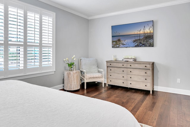 bedroom featuring crown molding and dark hardwood / wood-style floors