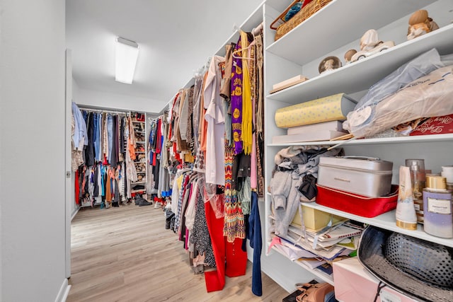 walk in closet featuring light wood-type flooring