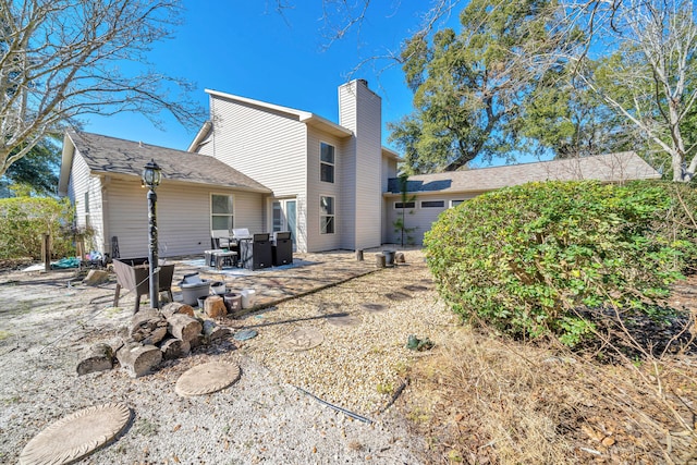 back of house featuring a patio area