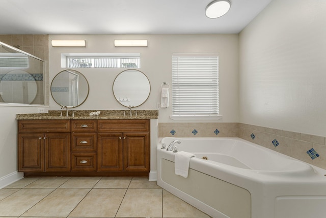 bathroom featuring tile floors and dual vanity