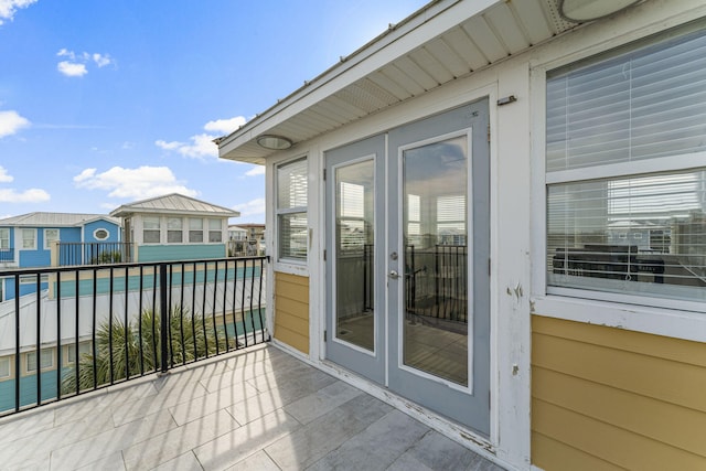 balcony featuring french doors