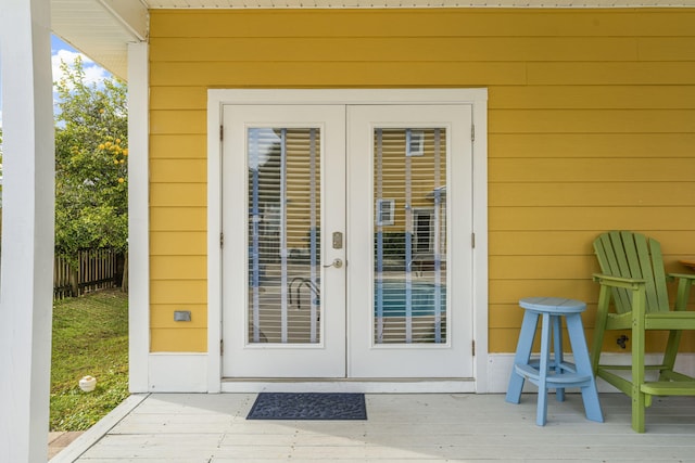 property entrance featuring french doors