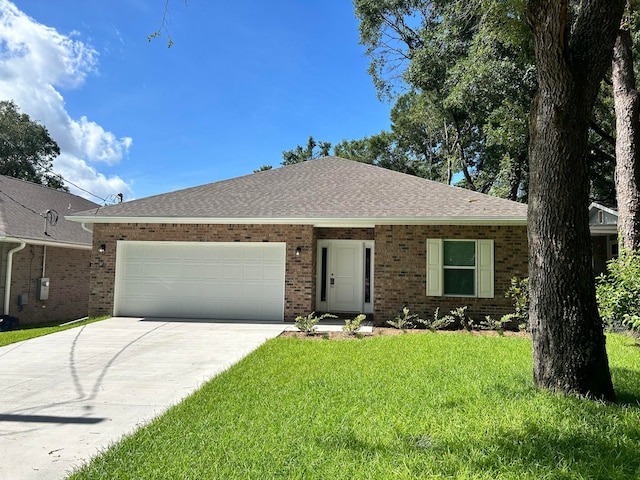 ranch-style home featuring a garage and a front lawn