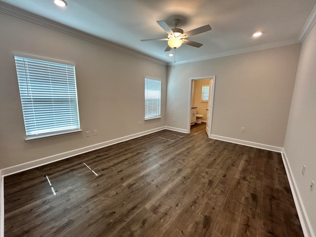 unfurnished room with ceiling fan, dark hardwood / wood-style floors, and crown molding