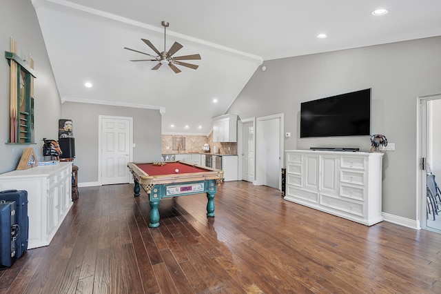 rec room with lofted ceiling, pool table, ceiling fan, crown molding, and dark wood-type flooring