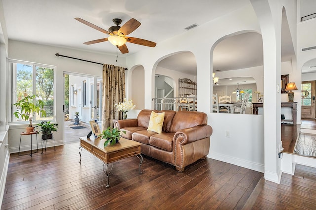 living room with dark hardwood / wood-style floors