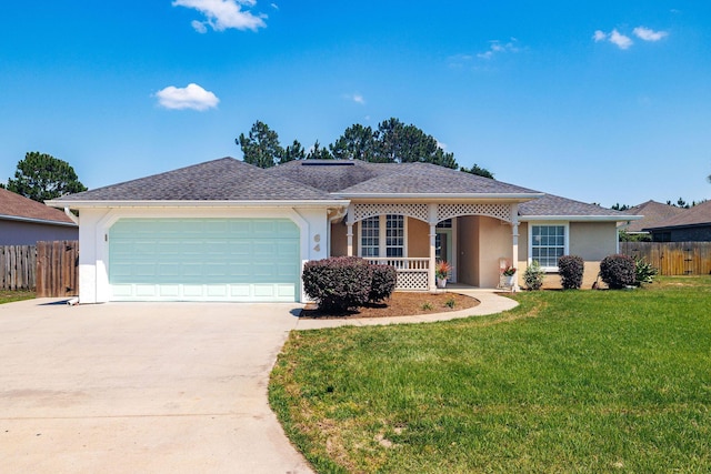 ranch-style home featuring a garage and a front yard