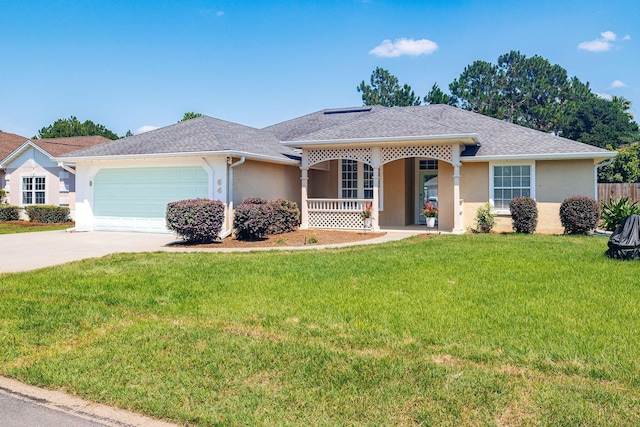 ranch-style house with a garage, covered porch, and a front lawn