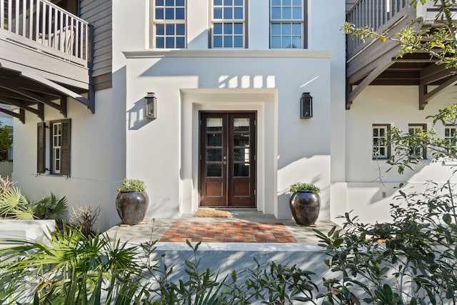 doorway to property featuring french doors and a balcony