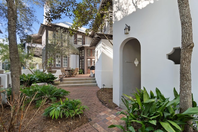 view of front of home featuring french doors and a patio area