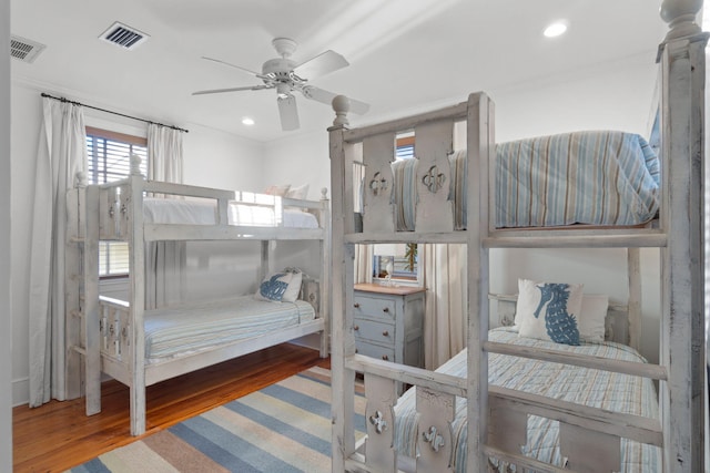 bedroom featuring ceiling fan and hardwood / wood-style flooring