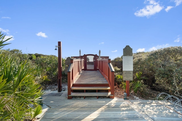 view of home's community with a wooden deck