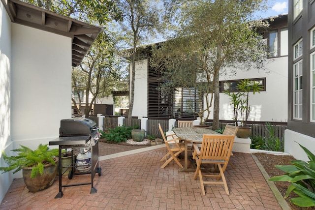 16 S Green Turtle Ln, Inlet Beach, FL 32461 - view of patio / terrace featuring a grill and outdoor dining space