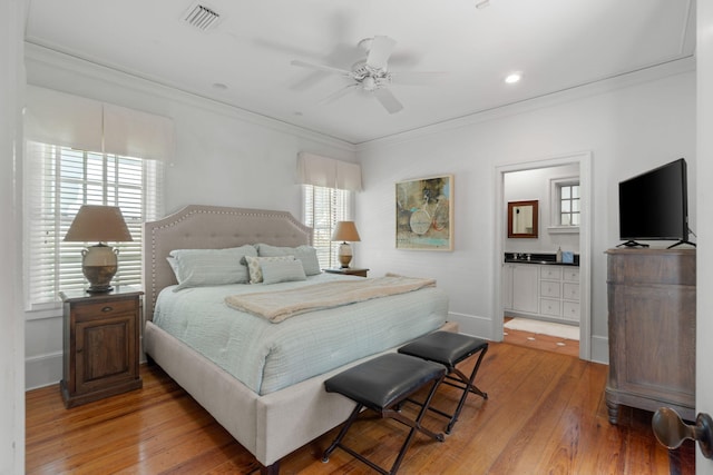 16 S Green Turtle Ln, Inlet Beach, FL 32461 - bedroom with baseboards, crown molding, visible vents, and light wood-style floors