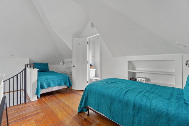 16 S Green Turtle Ln, Inlet Beach, FL 32461 - bedroom featuring vaulted ceiling and hardwood / wood-style floors