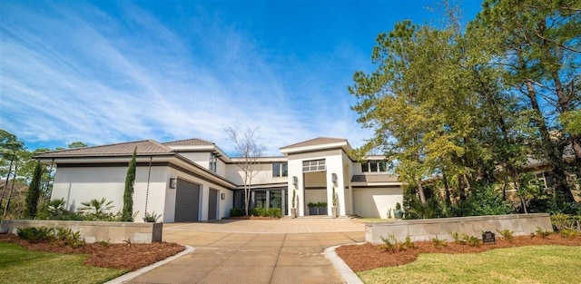 view of front of home with a garage