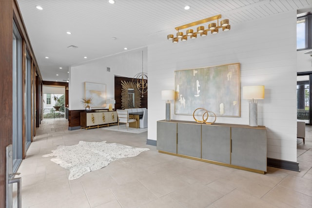 living room featuring plenty of natural light and light tile flooring