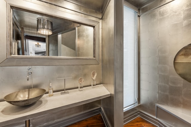 bathroom with vanity and hardwood / wood-style flooring