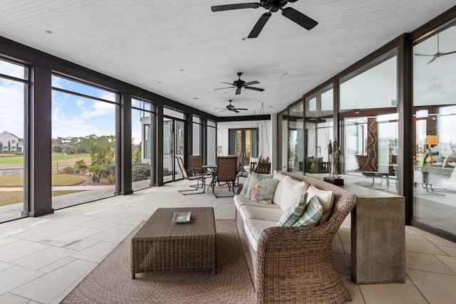 sunroom / solarium with ceiling fan