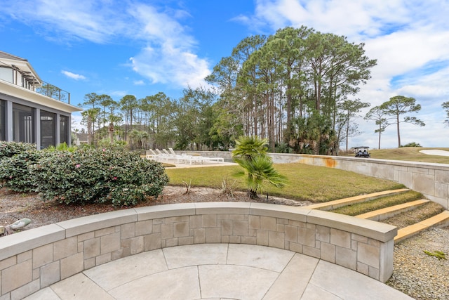 exterior space with a yard and a patio area