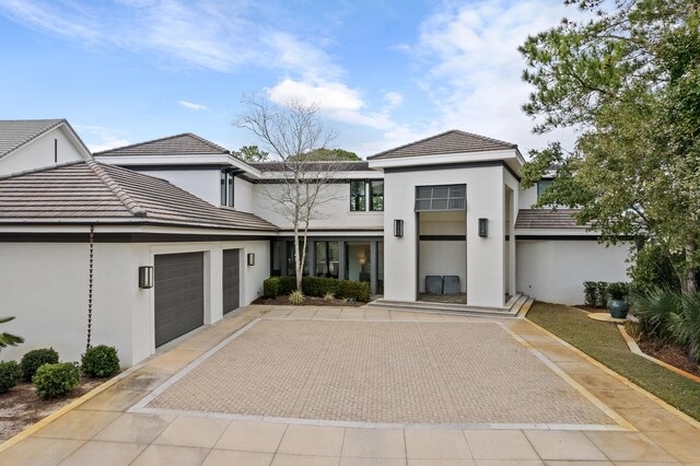 view of front of property featuring a garage