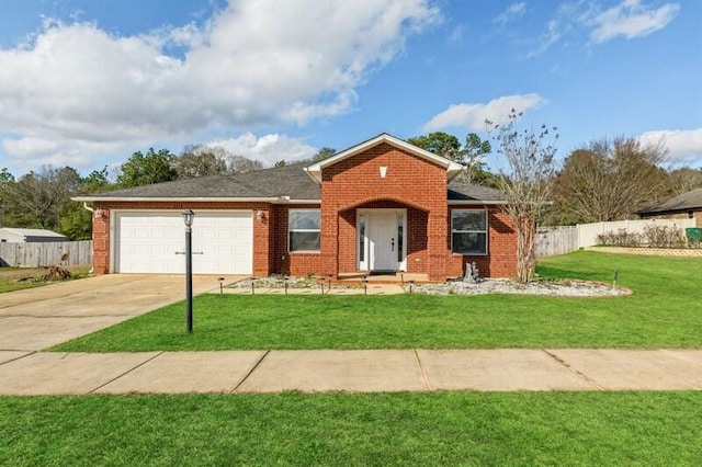 ranch-style house featuring a garage and a front yard