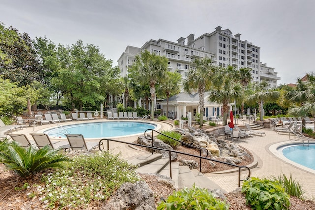 view of swimming pool with a patio