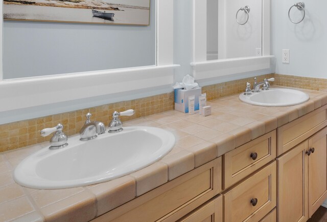 bathroom with double vanity