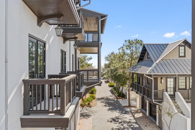 view of property exterior with a balcony