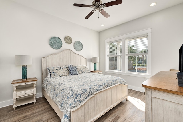 bedroom featuring dark wood-type flooring and ceiling fan