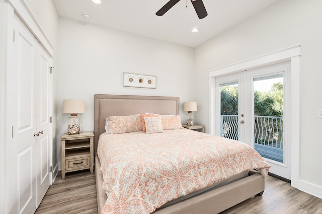 bedroom featuring a closet, ceiling fan, light hardwood / wood-style floors, and access to exterior