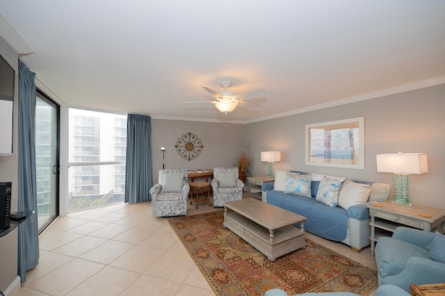 living room featuring ceiling fan, light tile floors, and ornamental molding