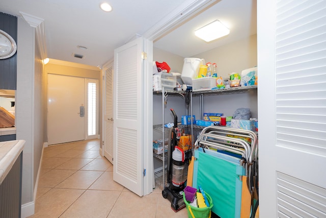 laundry area featuring tile patterned flooring and visible vents