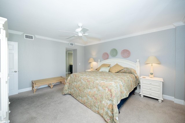 bedroom with light colored carpet, visible vents, crown molding, and baseboards