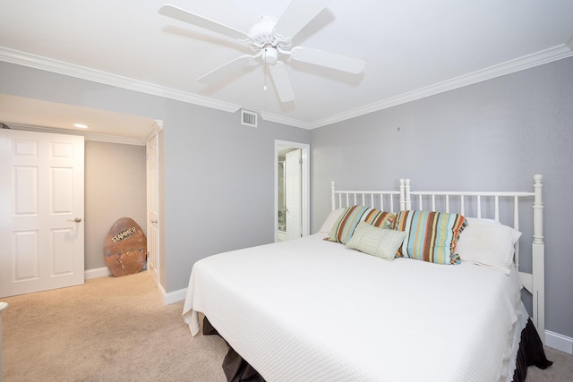 carpeted bedroom with baseboards, visible vents, ceiling fan, and ornamental molding