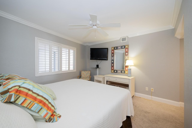 bedroom featuring baseboards, visible vents, a ceiling fan, crown molding, and carpet floors