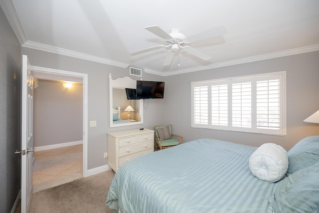 bedroom with baseboards, visible vents, ceiling fan, and ornamental molding