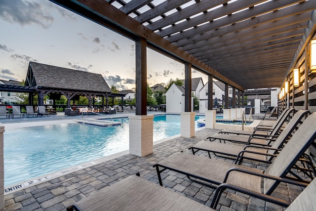 view of swimming pool with a pergola, a patio area, and a gazebo